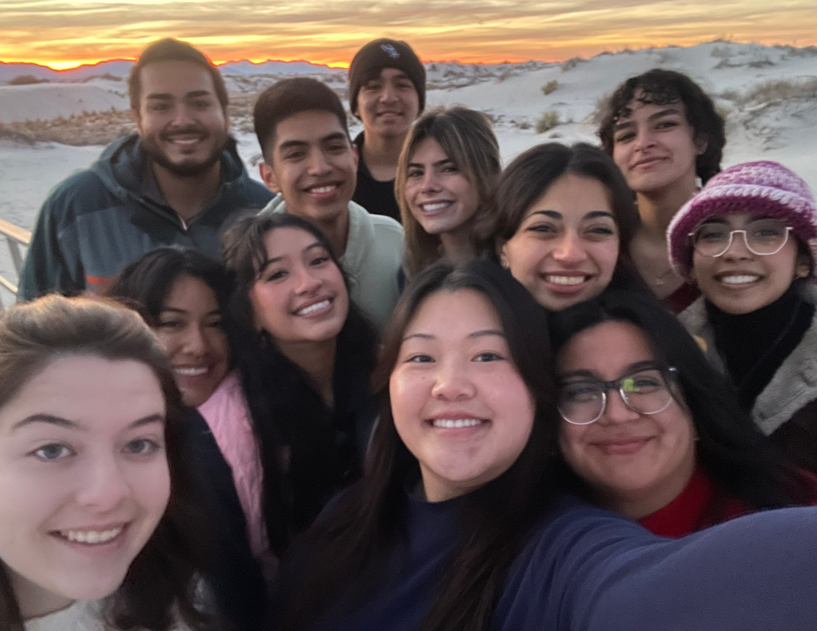 Group of UTSA students on a trip take a selfie on the mountains